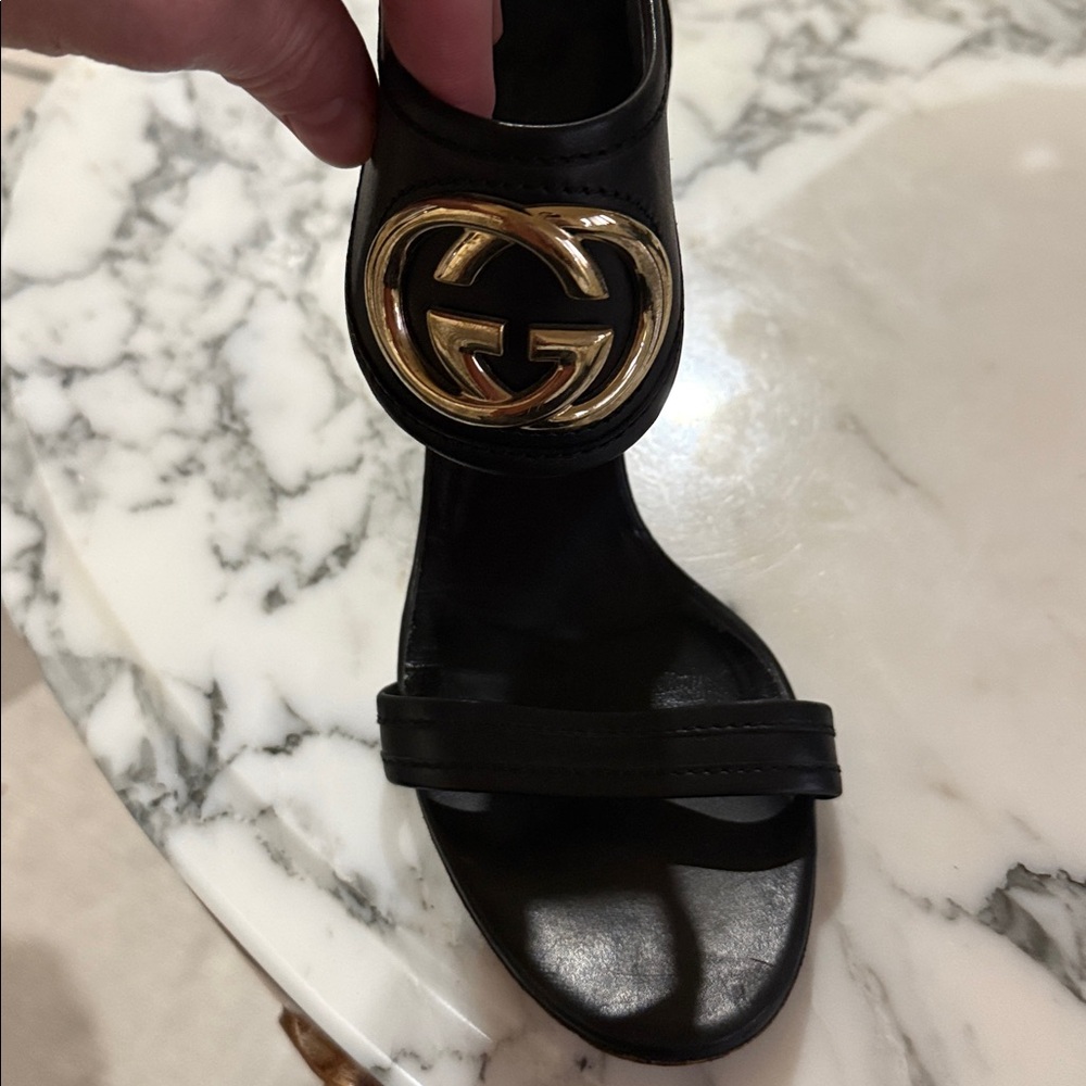 Gucci Black Leather Sandals with Gold Emblem